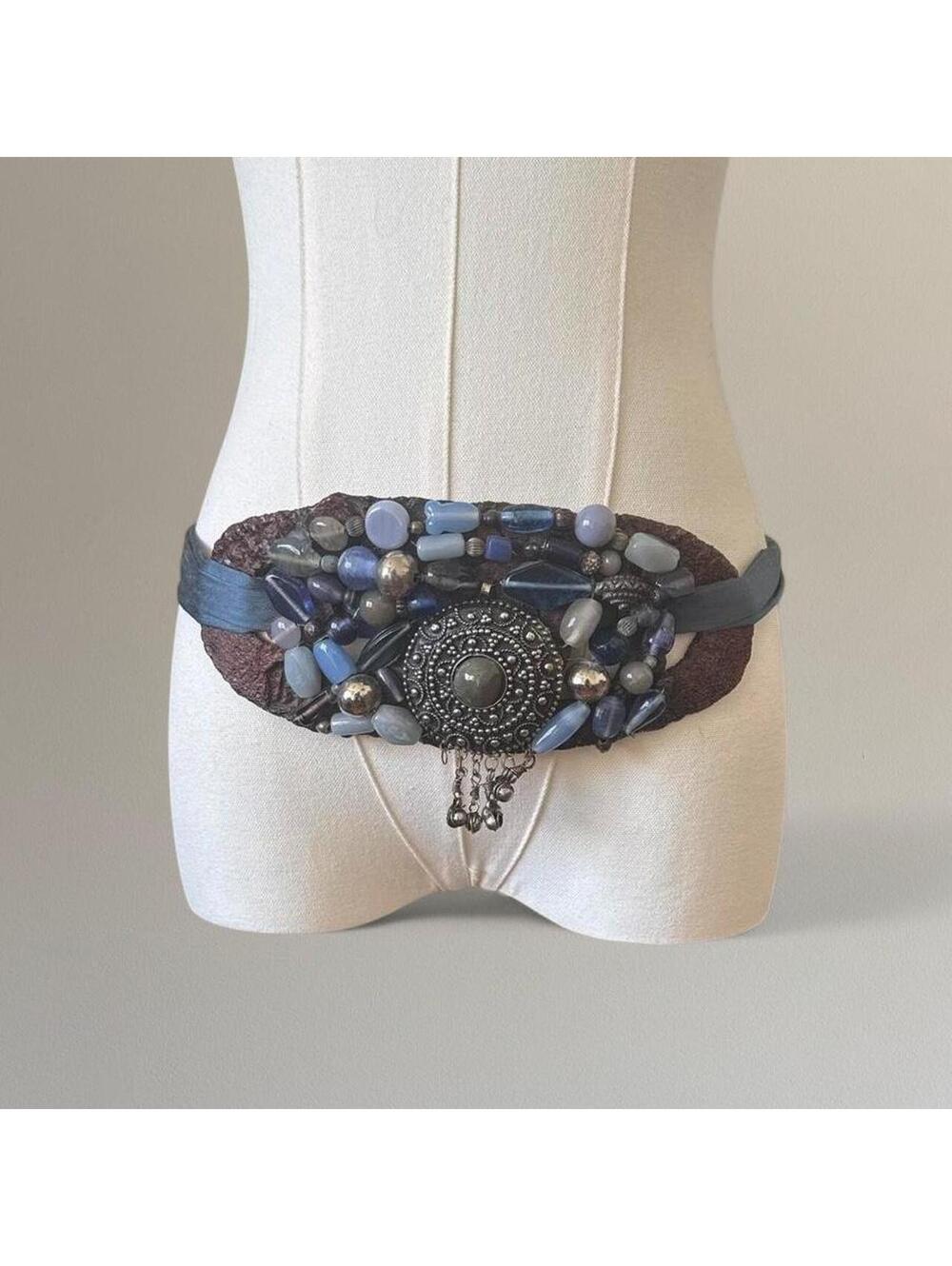 Hand beaded crystal belt.